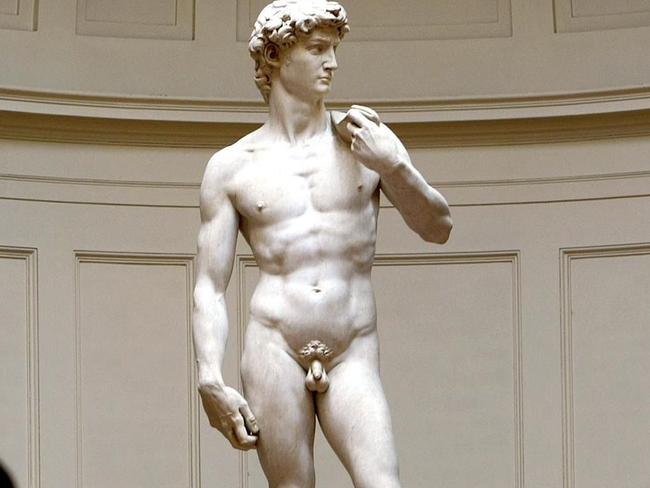MAY 24, 2004: Michelangelo's marble statue of David after major restoration, is presented to audience in Accademia Gallery, Florence in Italy, 24/05/04. Art