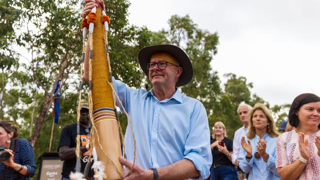 Prime Minister Anthony Albanese holds up didgeridoo (yidaki) during Garma Festival 2022. Picture: Getty