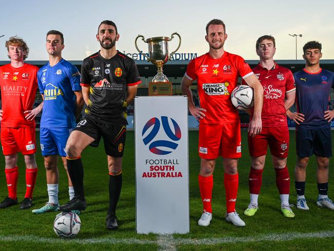 19/5/23 - The Football SA Federation Cup finals will be held next week. Club captains (L-R) Joseph Cox from Campbelltown City (U18s) Taj Claridge from  Modbury Jets Reserves, Anthony Solagna from MetroStars, Alex Mullen from Campbelltown City, Fergus Lynch from Adelaide United Reserves and Matias Aloisi from FSA NTC (U18s) at ServiceFC Stadium. Picture: Naomi Jellicoe