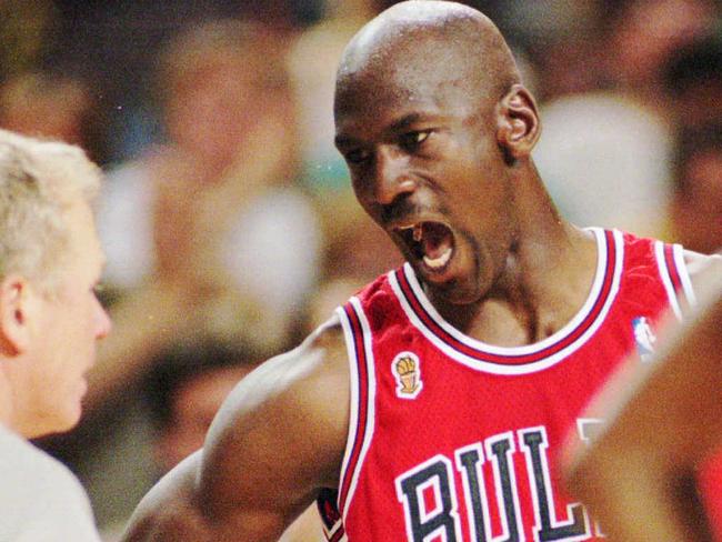 Basketball - Chicago Bulls v Seattle SuperSonics 1996 NBA game 4 finals match Michael Jordan with Mike Mathis. USAusa referee