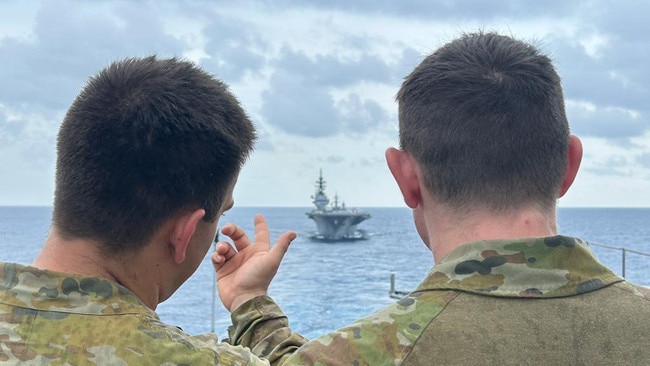 The flight deck of HMAS Canberra as a Japanese carrier passes by on the South China Sea. Picture: Supplied