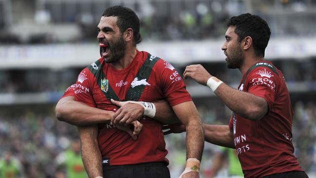 Greg Inglis celebrates his try with Rabbitohs teammates. Picture: AAP