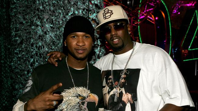 Singer Usher with Combs pose backstage in 2004. Picture: Getty Images