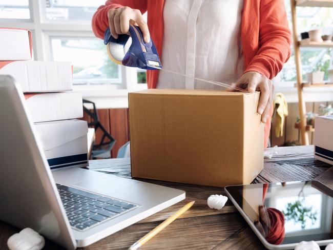 A woman selling items online to make money. Picture: iStock.