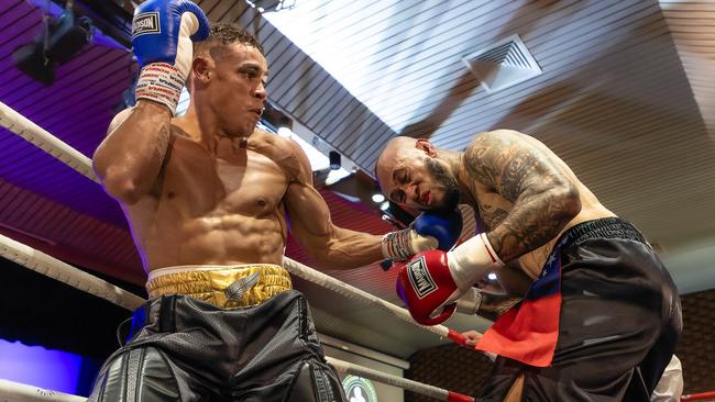 David Nyika (left) fights Waikato Falefehi. Picture: Darren Burns