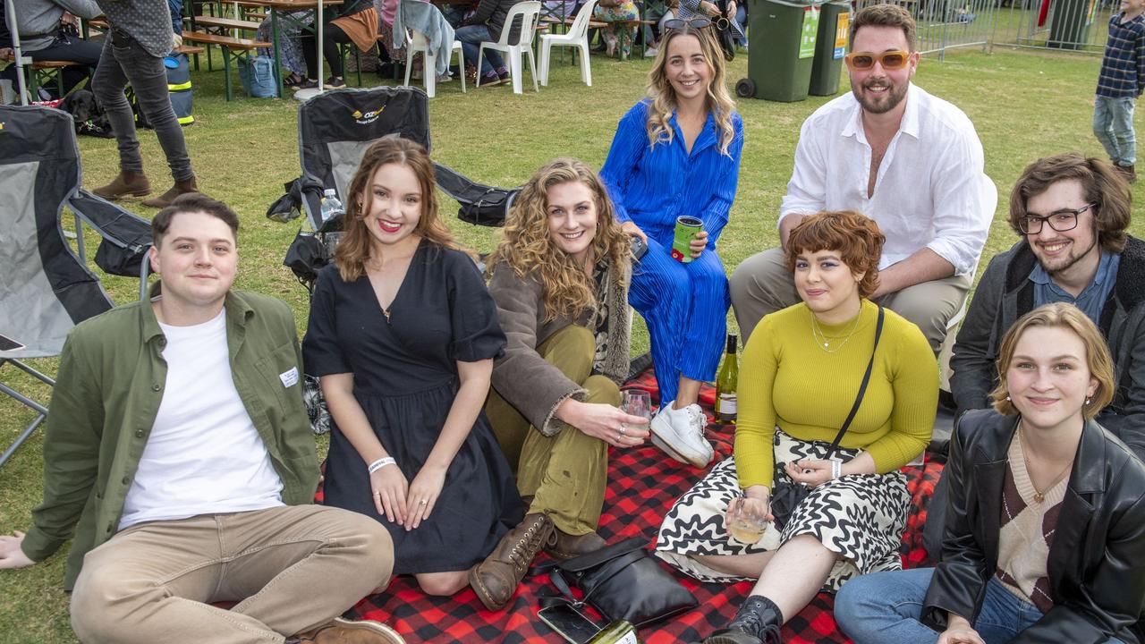 (from left) Noah Stevens, Alex Stevens, Lizard Ryan, Portia Timms, Alex Toner, Josie Christensen, Thomas Butler and Victoria Brown. Festival of Food and Wine, Queens Park, Toowoomba Carnival of Flowers. Sunday, September 11, 2022. Picture: Nev Madsen.