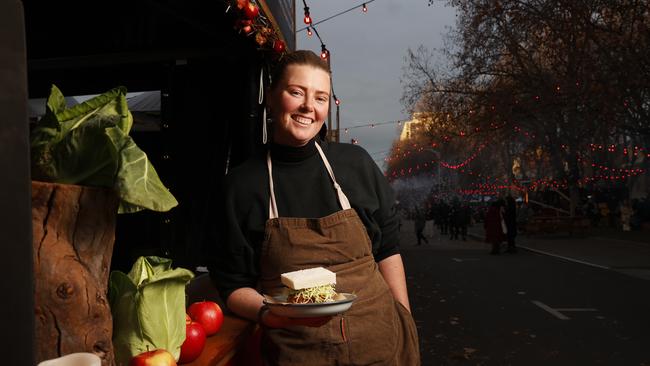Chef Lilly Trewartha with her Japanese style fried pork sando from Katsu by Lilly Trewartha. Dark Mofo Winter Feast. Picture: Nikki Davis-Jones