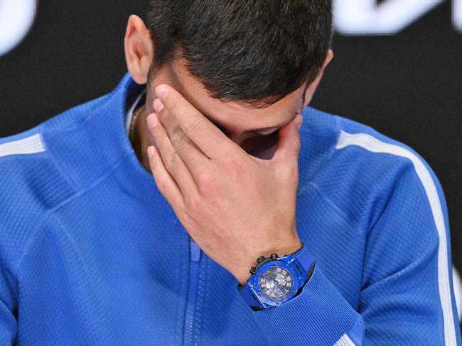 Serbia's Novak Djokovic attends a press conference after losing against Italy's Jannik Sinner in their men's singles semi-final match on day 13 of the Australian Open tennis tournament in Melbourne on January 26, 2024. (Photo by Saeed KHAN / AFP) / -- IMAGE RESTRICTED TO EDITORIAL USE - STRICTLY NO COMMERCIAL USE --