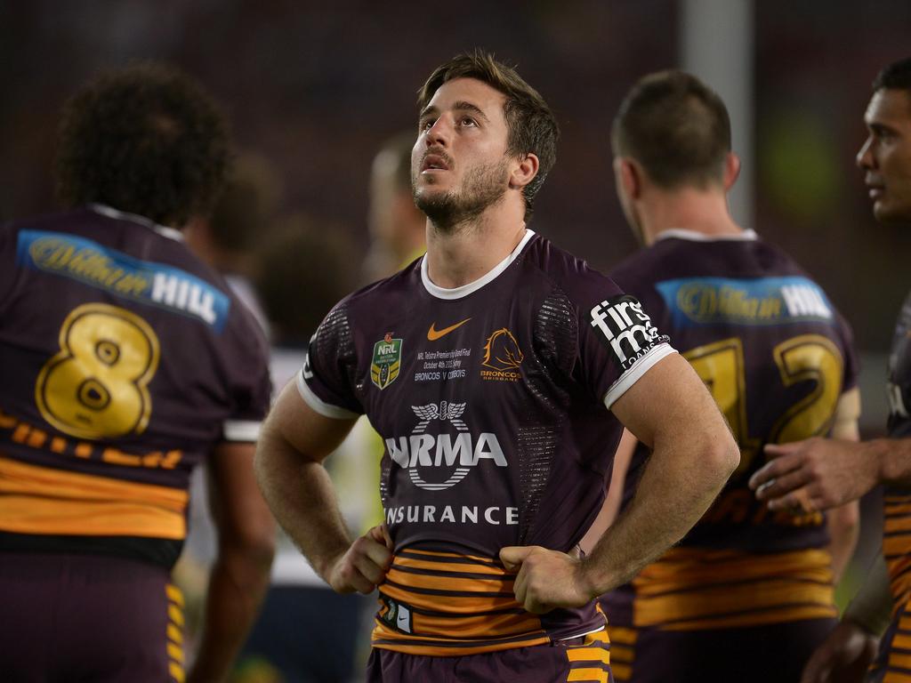 Ben Hunt comes up with a crucial knock on in golden point of the 2015 grand final, all but gifting the win to the Cowboys. Picture: Getty Images