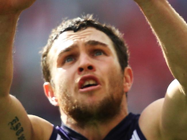 Fremantle's Hayden Ballantyne in front of Sydney Swans' Nick Smith during AFL Qualifying Final between Sydney Swans v Fremantle Dockers at ANZ Stadium. pic. Phil Hillyard