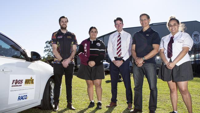 RACQ’s David Contarini, second right, with Marsden High teacher Steven Page, student Kerry Cohen, principal Andrew Peach and learner driver Jada Cohen. RACQ gave the school a car for students to learn to drive in The Artie Beetson Academy, which is celebrating its 10th anniversary. Picture: Sarah Marshall