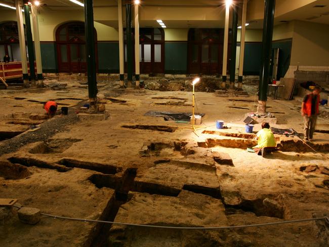 Archaeologists working on a colonial gravesite in the basement of the Town Hall in Sydney in 2008. Picture: Stephen Cooper