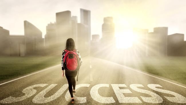 Female college student walk on the road to start her success