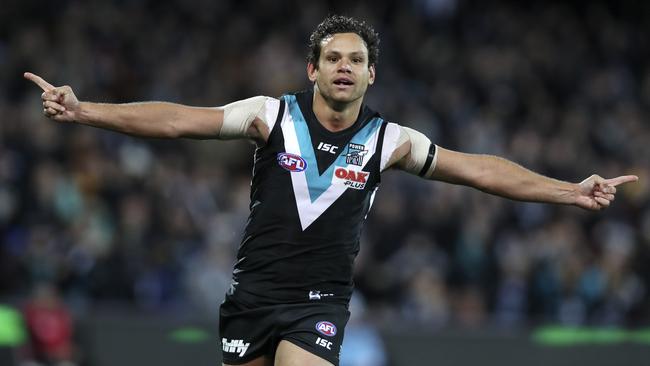 Port Adelaide’s Steven Motlop celebrates after kicking the winning goal.