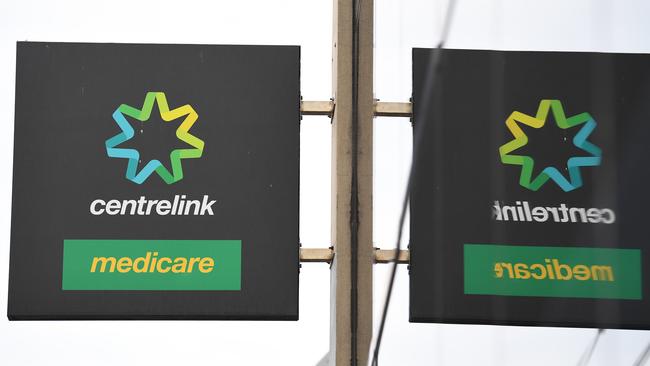 Generic image of Centrelink signage at the Prahran office in Melbourne, Tuesday, March 24, 2020. Centrelink offices around Australia have been inundated with people attempting to register for the Jobseeker allowance in the wake of business closures due to the COVID-19 pandemic. (AAP Image/James Ross) NO ARCHIVING