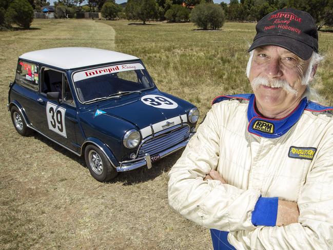 Michael Holloway keeps him self fit racing cars. In total he has 17 cars. Michael pictured with one of his racing Mini's. Picture: Sarah Matray