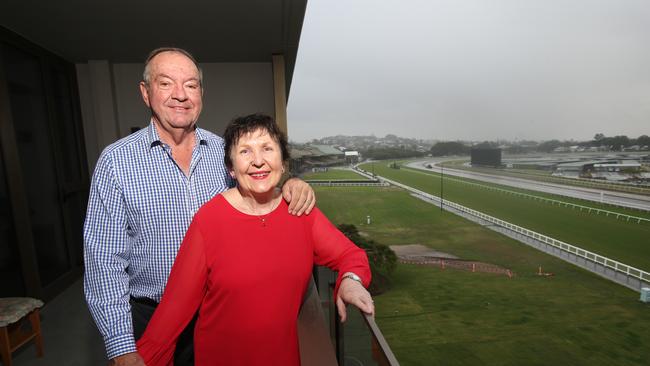 The overcast evening was not enough to wipe the smile off the faces of Russell and Jenny Reed at their new home trackside at Eagle Farm. Picture: AAP/ Ric Frearson.