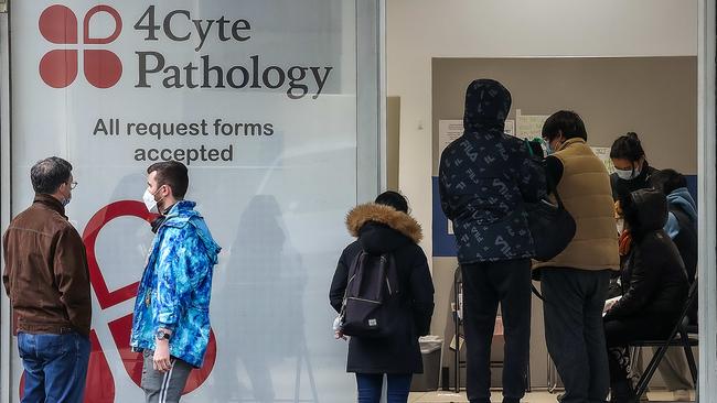 People line up for coronavirus tests in Russell St, Melbourne. Picture: NCA NewsWire / Ian Currie