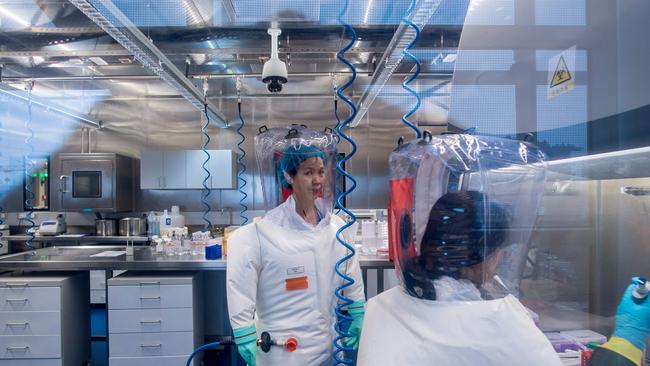 Chinese virologist Shi Zhengli inside the P4 laboratory in Wuhan, capital of China's Hubei province. Picture: Johannes Eiselle / AFP