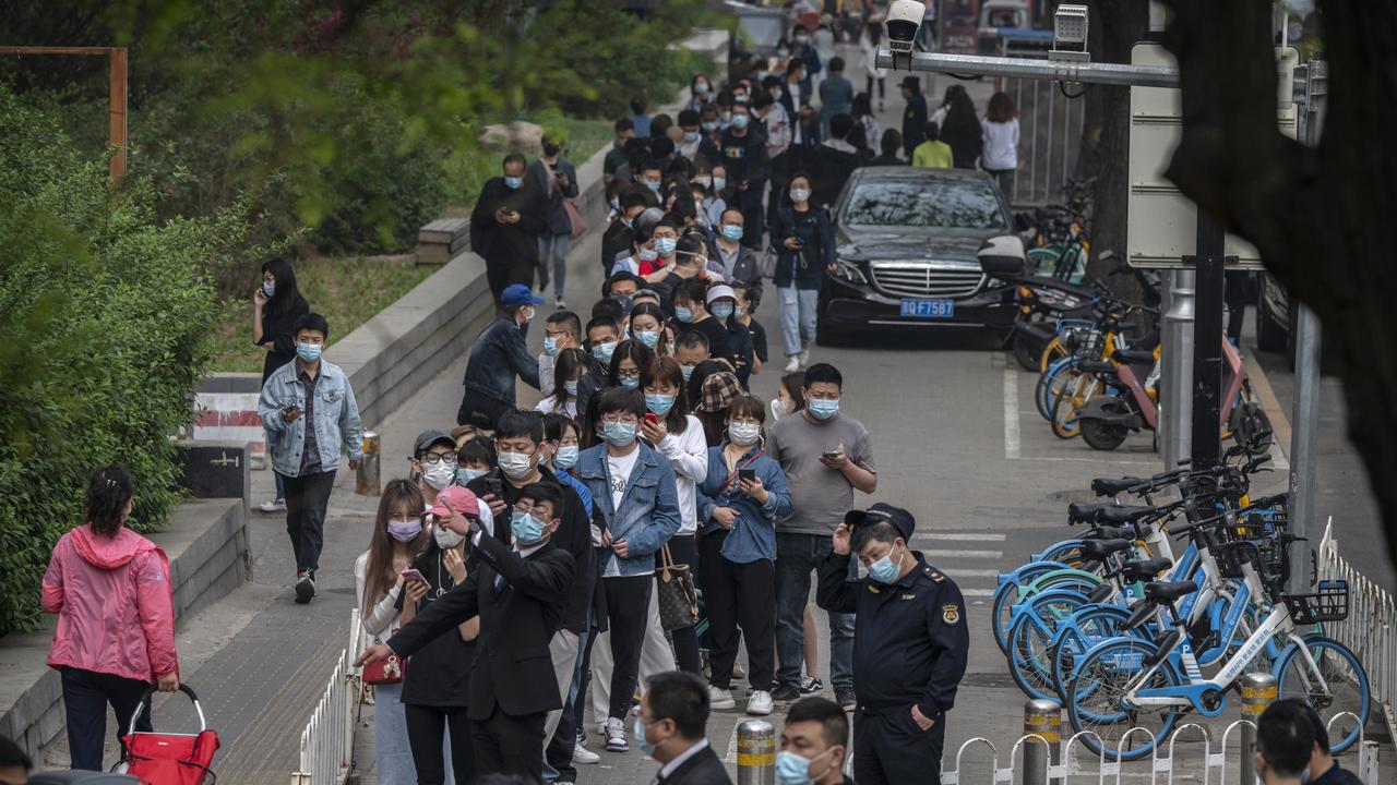 Beijing Covid-19 Spike Prompts Mass Testing, Panic Buying | The Australian