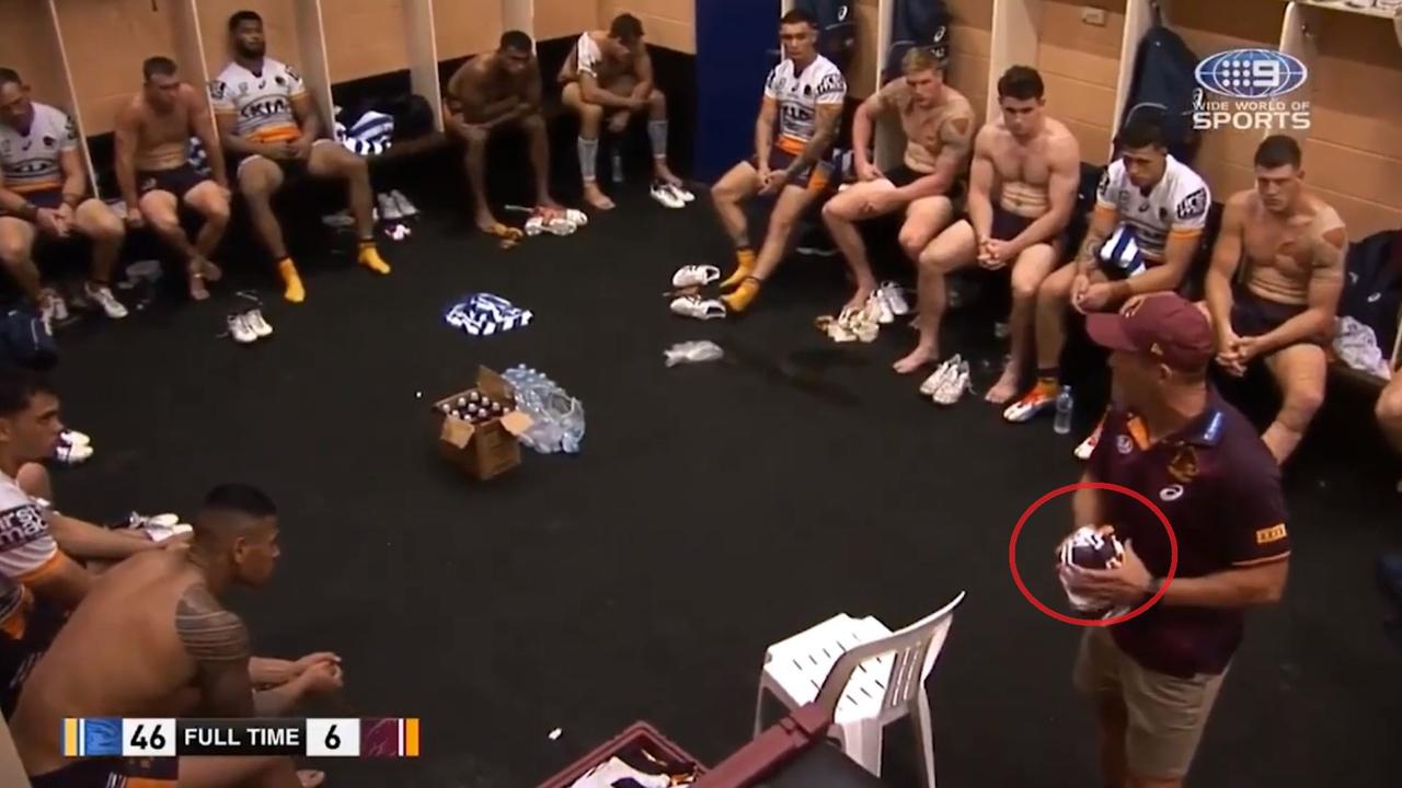 Kevin Walters balls up the Broncos jersey as he stares down his players.