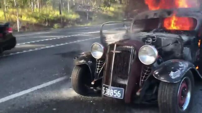 Classic car goes up in flames on Bruce Highway