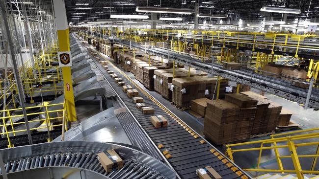 Packages ride on a conveyor system at an Amazon fulfilment centre in Baltimore. (AP Photo/Patrick Semansky)