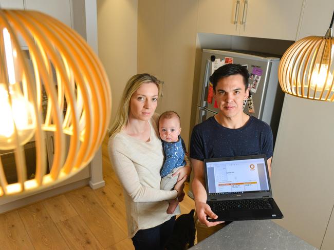 Anthony and Alannah James, with baby Xavier, in their Klemzig home. Their electricity bill more than doubled in the last two quarters.