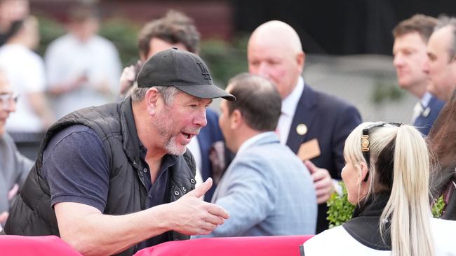 Brett Ratten made it to The Valley in jeans and a puffer jacket. Picture: Scott Barbour—Racing Photos via Getty Images.