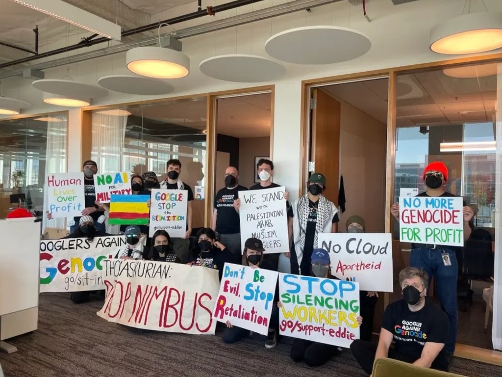 A large group of Google employees hold signs protesting their company’s participation in “Project Nimbus.” Picture: X/@NoTechApartheid