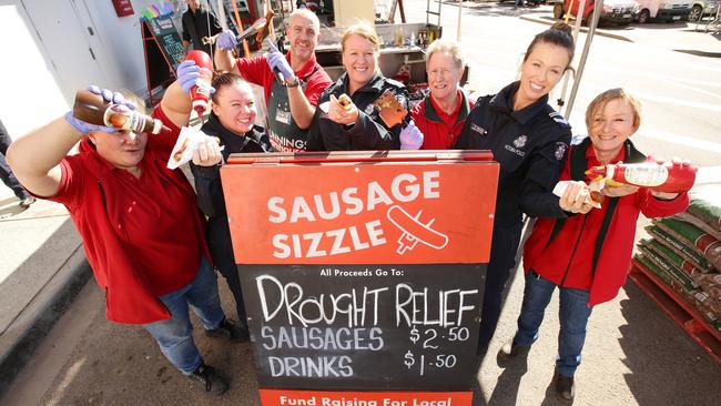 The Bunnings sausage sizzle — a delicious barbecue snag in bread — is a much-loved Australian pastime. Picture: Norm Oorloff