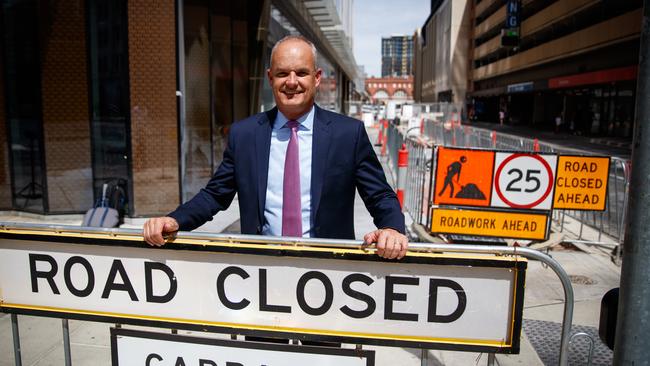 RAA chief executive officer Nick Reade, in front of roadworks at the corner of Franklin and Pitt streets, Adelaide, highlighting a $2bn SA road maintenance backlog. Picture Matt Turner.