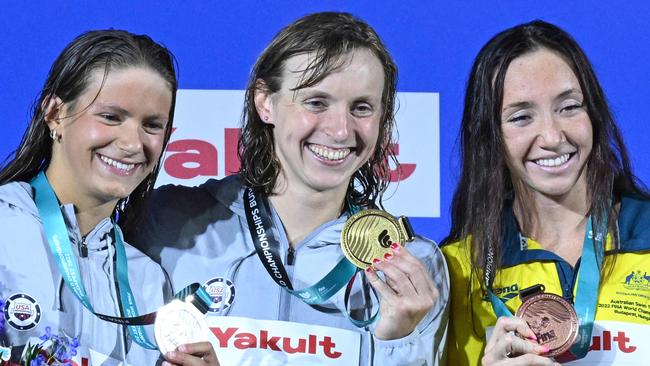 Silver medallist USA's Katie Grimes (L), gold medallist USA's Katie Ledecky (C) and bronze medallist Australia's Lani Pallister (R).