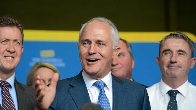 Prime Minister Malcolm Turnbull visits the Macadamia Processing Company at Alphadale with Page MP Kevin Hogan and Deputy Barnaby Joyce. Picture: Cathy Adams