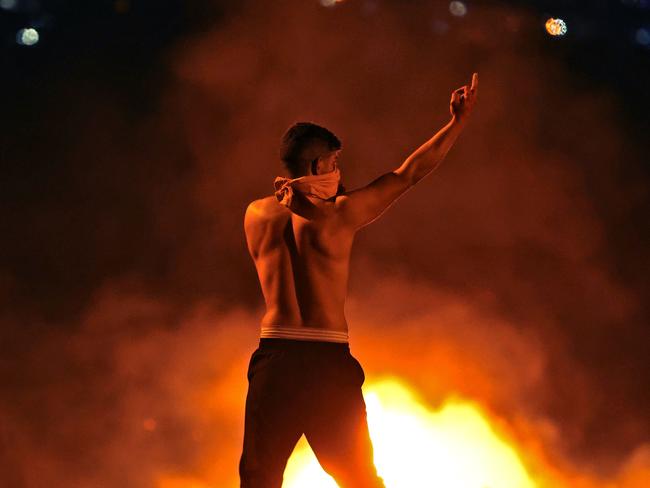 Palestinian protesters clash with Israeli security forces at the Hawara checkpoint, south of Nablus city, in the occupied West Bank. Picture: AFP