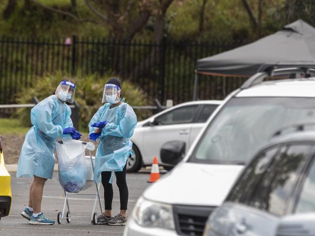 Heroic health workers at the COVID-19 pop-up testing site at Pittwater Park, known to locals as Rat Park. Picture: Jenny Evans/Getty Images