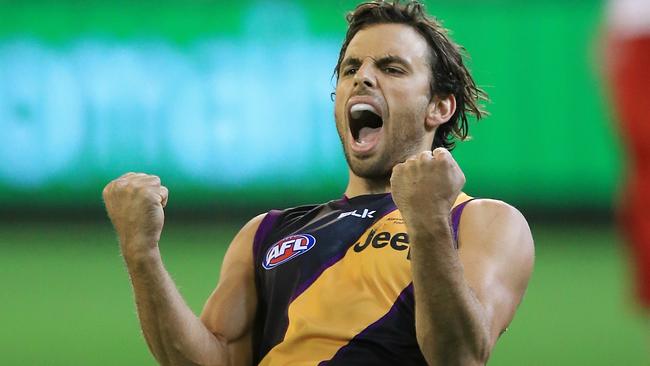 Sam Lloyd kicks the winning goal after the siren. Picture: Wayne Ludbey