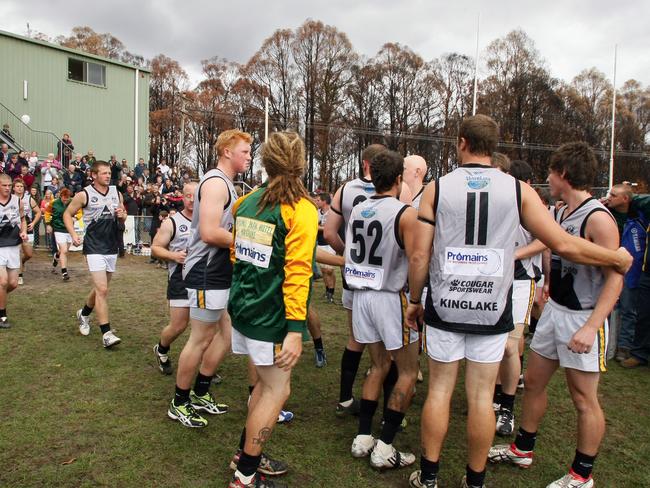 Kinglake runs out for its first game after the Black Saturday bushfires. 