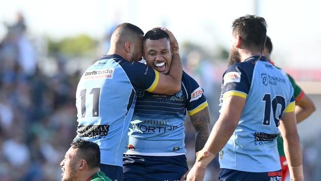 Jerome Veve of the Devils is congratulated by teammate Moses Noovao-McGreal. (Photo by Bradley Kanaris/Getty Images)