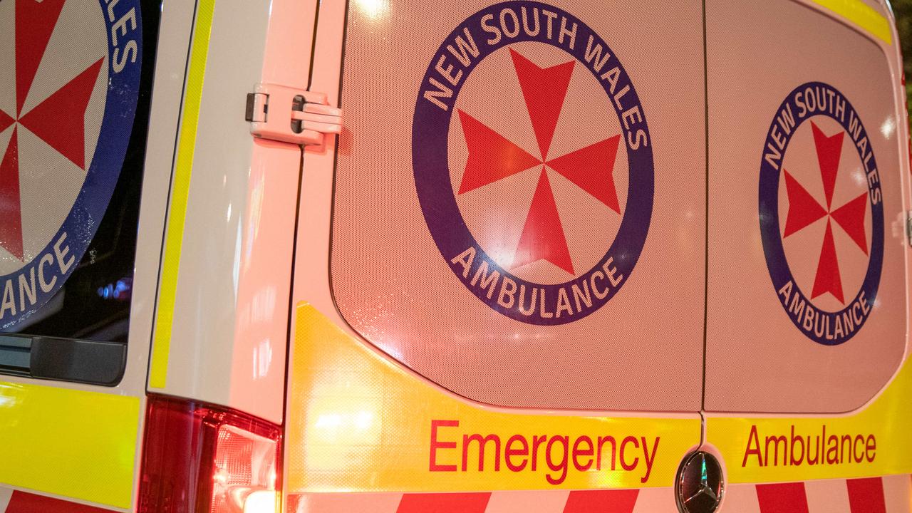 Two dragged from burning car as crash sets bushland alight