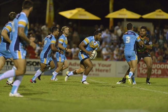 Titans player Kalifa Faifai Loa on the attack in their NRL pre-season trial against New Zealand Warriors at Clive Berghofer Stadium, Saturday, February 7, 2015. Photo Kevin Farmer / The Chronicle. Picture: Kevin Farmer