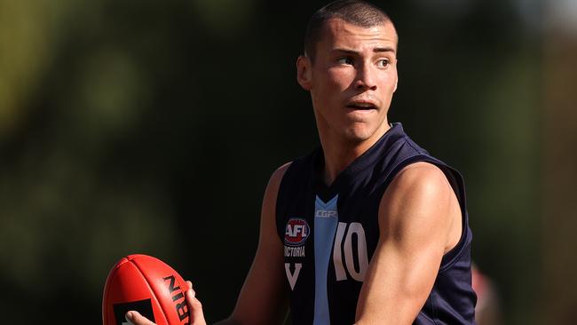 Joel Fitzgerald in action during Vic Metro’s trial game against Vic Country.