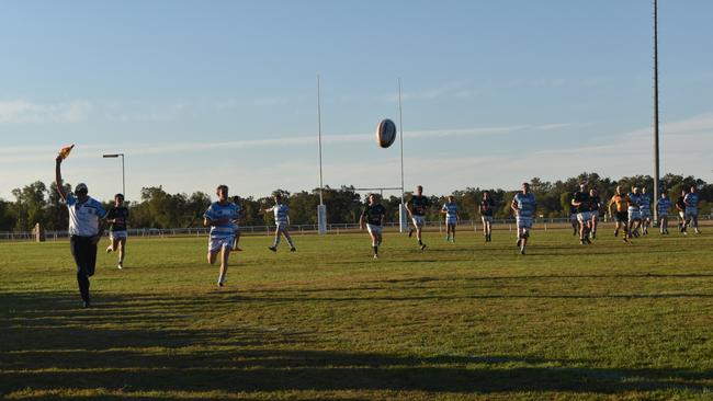 Spectators cheer on as they watch the A Grade Roma vs Condamine match at the Roma Rugby Races at Bassett Park. Picture: Chloe Cufflin.