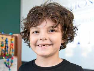 MILESTONE MOMENT: Hayden Lee rings the 'last chemo bell' after completing more than three years of treatment for leukaemia. Picture: Emma Murray