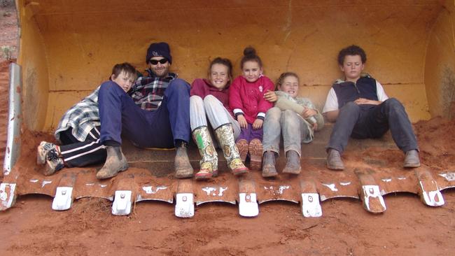 Young Tyler (third from left) with her dad, Ted, brother Reece and cousins on an outback prospecting trip. Picture: Supplied