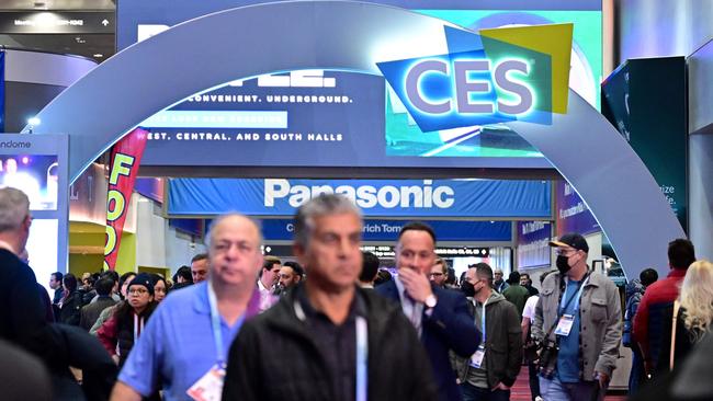 People make their way through showfloors at the Las Vegas Convention Center during the Consumer Electronics Show (CES) in Las Vegas, Nevada. (Photo by Frederic J. BROWN / AFP)