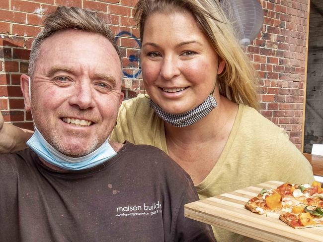 People being served at new outdoor dining areas being set up in car parking spaces Footscray. Andrew and Jo Harvey co- owners of Back Alley SallyÃs have a pizza and beer with Justin Matthews, Jez Hargreaves and Pitch Thawonyutorn. Picture: Tim Carrafa