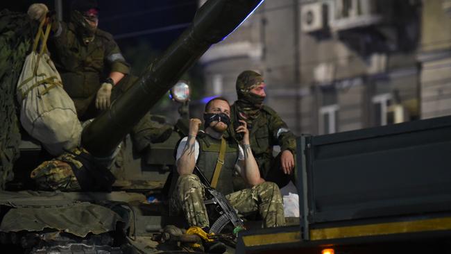 Members of the Wagner Group prepare to depart from the Southern Military District’s headquarters and return to their base on June 24 in Rostov-on-Don, Russia. Picture: Getty Images