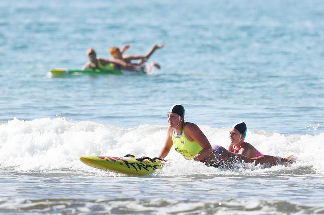 Competitors in the open womens board rescue event. Tasmanian Surf Lifesaving Championships at Clifton Beach. Picture: NIKKI DAVIS-JONES