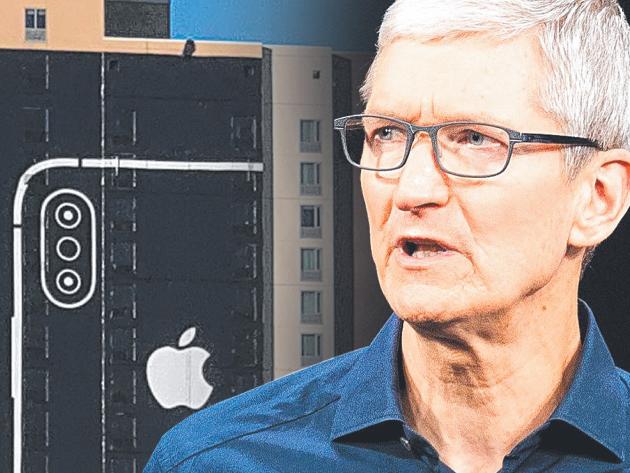 Apple CEO Tim Cook and the billboard his company placed near the CES consumer technology festival in Las Vegas last month